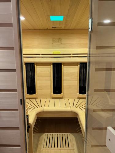 a view of the inside of a room with a hallway at Grenoble LA SUITE 2 spa jaccuzzi et sauna privatif in Grenoble