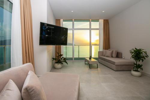 Μια τηλεόραση ή/και κέντρο ψυχαγωγίας στο Toto Hotel & Apartments
