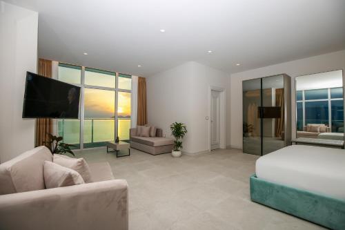 Ένα ή περισσότερα κρεβάτια σε δωμάτιο στο Toto Hotel & Apartments