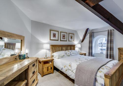 Postel nebo postele na pokoji v ubytování Brookside Cottage