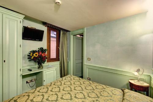 Cama o camas de una habitación en Palazzo La Scala