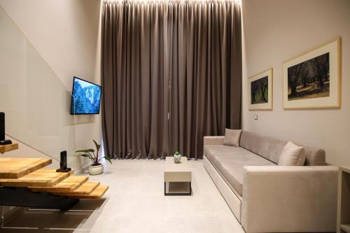 Μια τηλεόραση ή/και κέντρο ψυχαγωγίας στο Toto Hotel & Apartments
