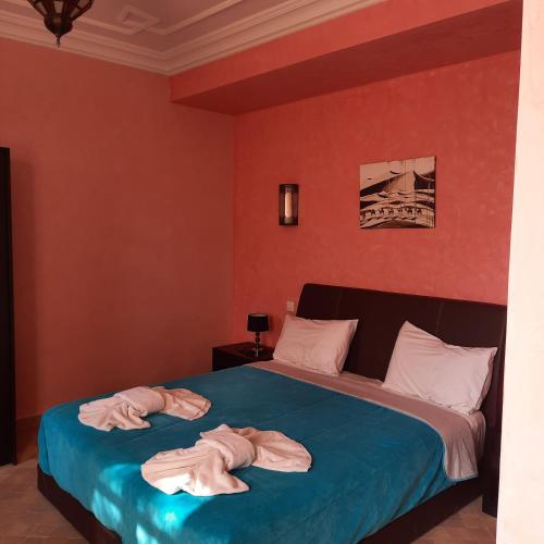 Katil atau katil-katil dalam bilik di Gîte Rural de Marrakech