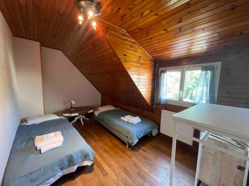 Postel nebo postele na pokoji v ubytování Maison familiale à Nanterre - Paris
