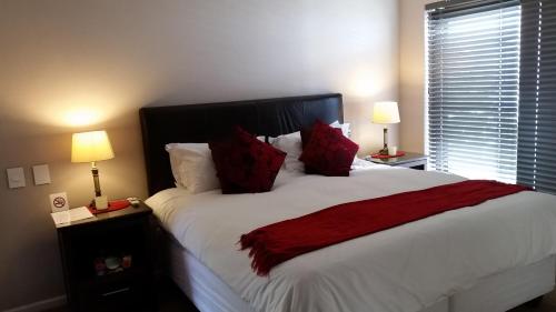 Aqua Terra Boutique Guesthouse - Simon's Town, Cape Townにあるベッド