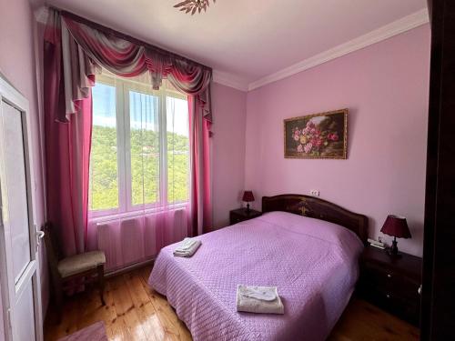 Postel nebo postele na pokoji v ubytování Mate Guesthouse