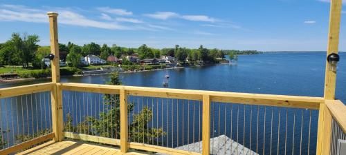 a view of a river from a balcony at Loza house adirondack skydeck unit lake front in Plattsburgh