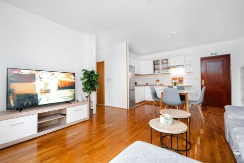 a living room with a large flat screen tv at Apartment Ana-Marija in Makarska
