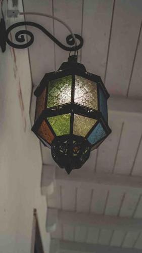 aendant light hanging from the ceiling of a building at Eleutheria beach villa by the beach in Torre Chianca