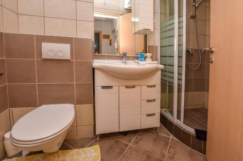 Koupelna v ubytování Apartments Silvana