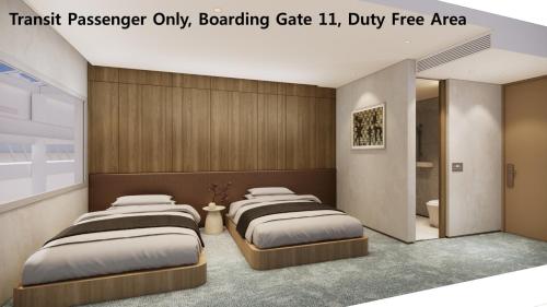 Postel nebo postele na pokoji v ubytování Incheon Airport Transit Hotel Terminal 1