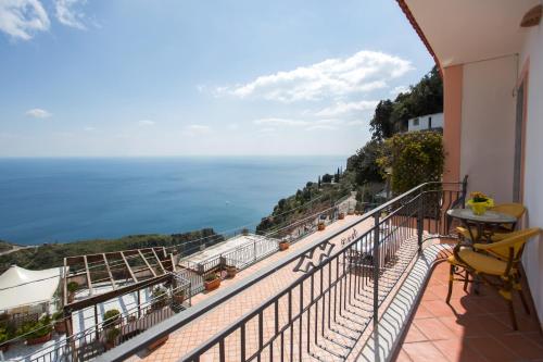 a balcony with a view of the ocean at Fico D'India Relais in Furore