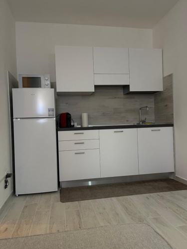 Dapur atau dapur kecil di Casa Mareluna a 300mt dal mare!