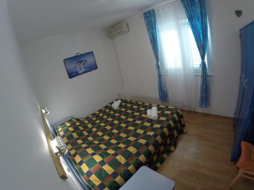 Postel nebo postele na pokoji v ubytování Apartment Lara Pisak