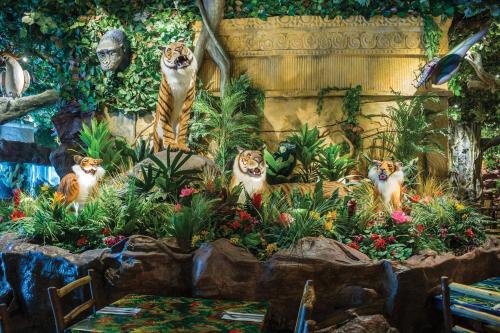 a group of tigers standing in a garden at Sheraton Niagara Falls in Niagara Falls