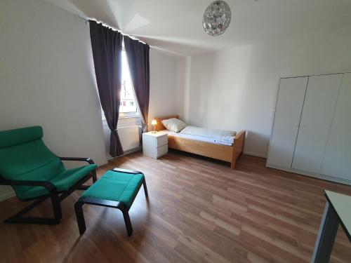Ένα ή περισσότερα κρεβάτια σε δωμάτιο στο Privatzimmer an der Uniklinik Mainz