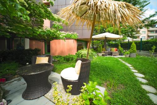 Jardín al aire libre en Tulip Inn Beaulieu Lausanne