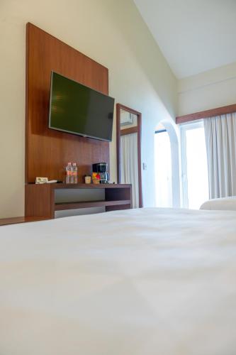Postel nebo postele na pokoji v ubytování Villas Coral Huatulco