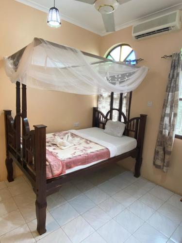 Letto o letti in una camera di Garden Lodge
