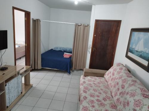 En eller flere senge i et værelse på APT Praia Central Itapema 90MTS do Mar