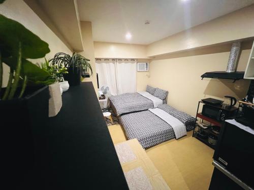 * * * E Best Value Room for up to 3にあるベッド