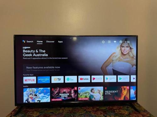 a flat screen television with a movie homepage at Sorell Barracks in Sorell