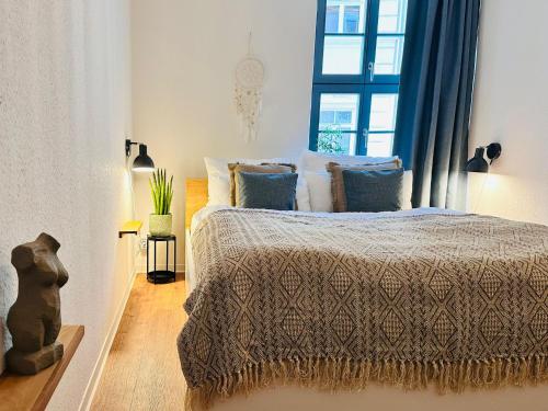 Postel nebo postele na pokoji v ubytování Im Herzen der Stadt - mit kostenlosem Parkplatz
