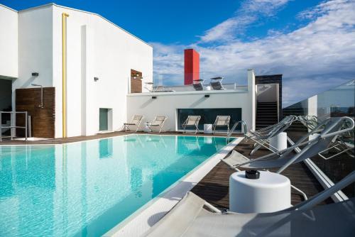 Πισίνα στο ή κοντά στο Dan Hotel