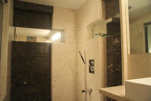 Koupelna v ubytování Hotel Beacon T2