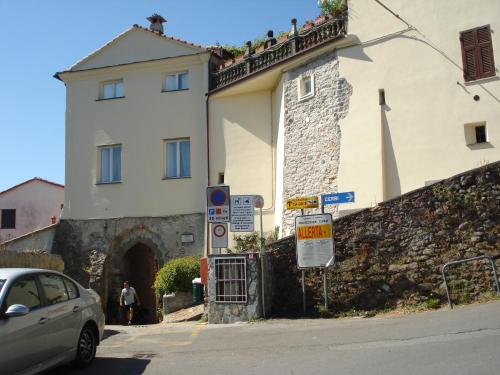 a building with a car parked in front of it at Da Giusè in Trebiano
