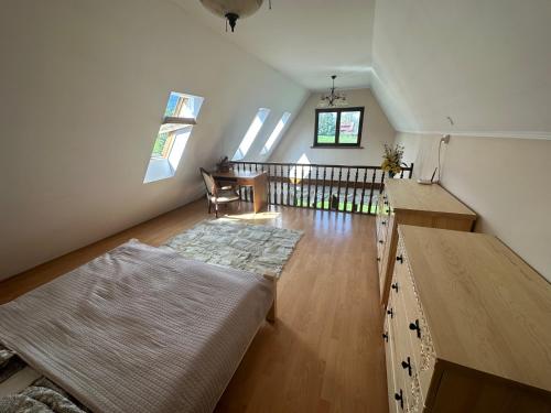 Ліжко або ліжка в номері Apartament in highlander style with view on Giewont & Tatra Mountain