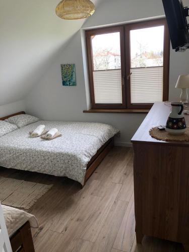 Ein Bett oder Betten in einem Zimmer der Unterkunft Noclegi DobraNocka