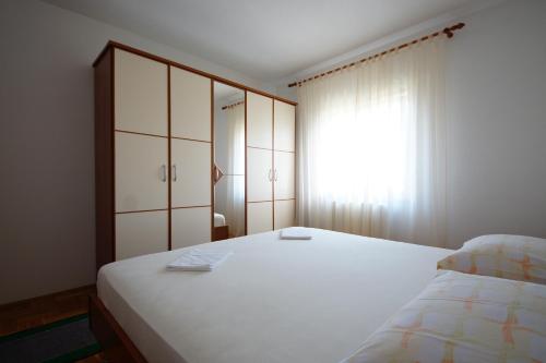 Postel nebo postele na pokoji v ubytování In Apartment