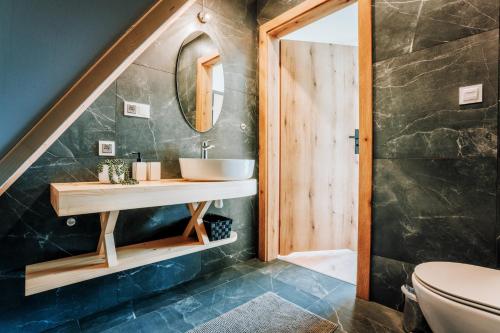 Kúpeľňa v ubytovaní Apartamenty Widok Tatr