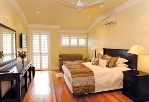 Ένα ή περισσότερα κρεβάτια σε δωμάτιο στο Sica's Guest House - The Loft