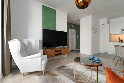 Μια τηλεόραση ή/και κέντρο ψυχαγωγίας στο Symphony Modern Tower Apartamenty