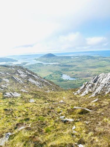 a view from the top of a mountain at Red Deer Cosy Apartment in Letterfrack Connemara in Letterfrack