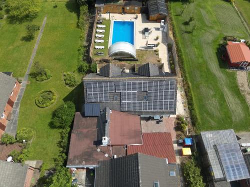 an overhead view of a building with solar panels at Familie Decker-Behrends in Upleward
