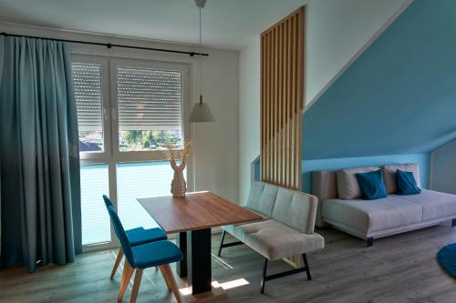 Zona de estar de Appartements am See