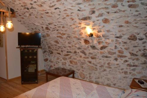 Кровать или кровати в номере Traditional Chios House