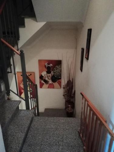 a stairway with a stair railing and a stair case at Global Guest in Sintra