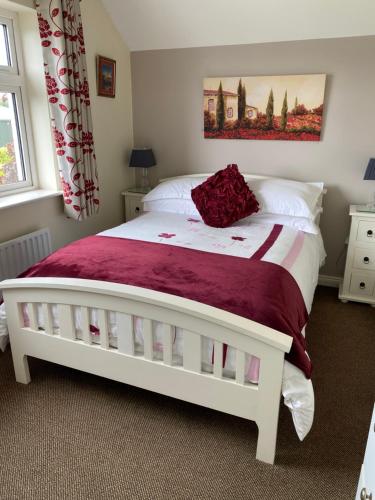 Ein Bett oder Betten in einem Zimmer der Unterkunft Ashbrook B&B