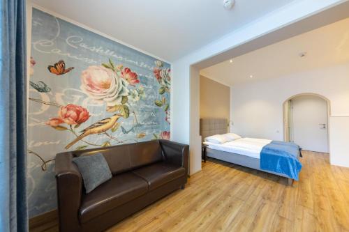 Postel nebo postele na pokoji v ubytování Hotel Unter den Linden