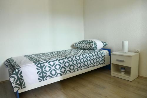 Postel nebo postele na pokoji v ubytování Apartman Noa