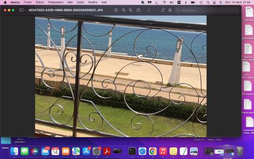 a view of the ocean from a window with a view at IBAIA maison d'hôte in Fnidek