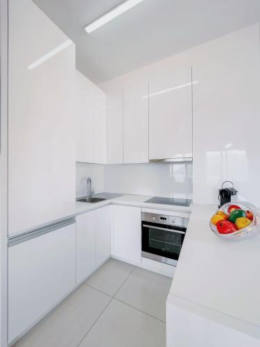 Кухня или мини-кухня в Montesun Apartments Bečići
