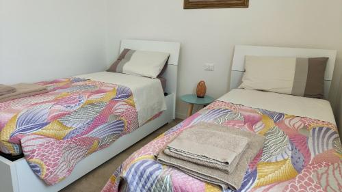 Ένα ή περισσότερα κρεβάτια σε δωμάτιο στο B&B Valle D'Astino