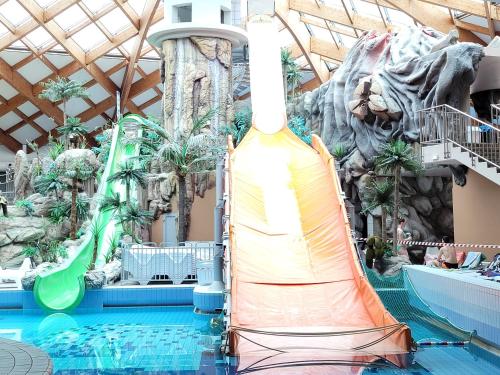 a water slide in a theme park with a waterfall at Appartement Camp Terme Čatež P93 in Čatež ob Savi