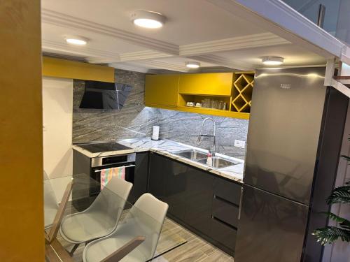 Η κουζίνα ή μικρή κουζίνα στο Rent Room 3 Rolandi Apartments