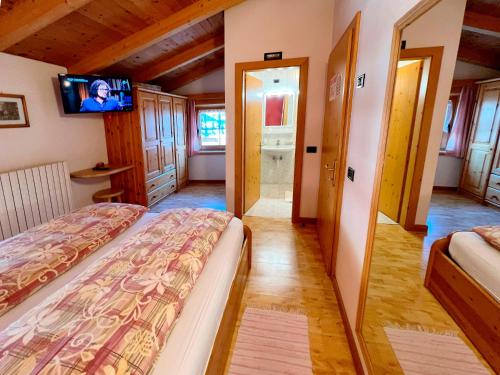 Postel nebo postele na pokoji v ubytování Garni Francescato